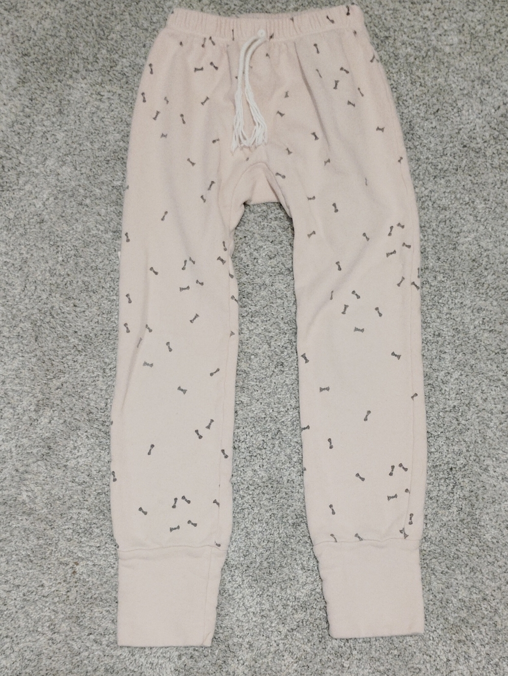 Kids Pink Drawstring Joggers with Bone Print